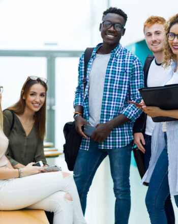 group-happy-young-students-looking-camera-university